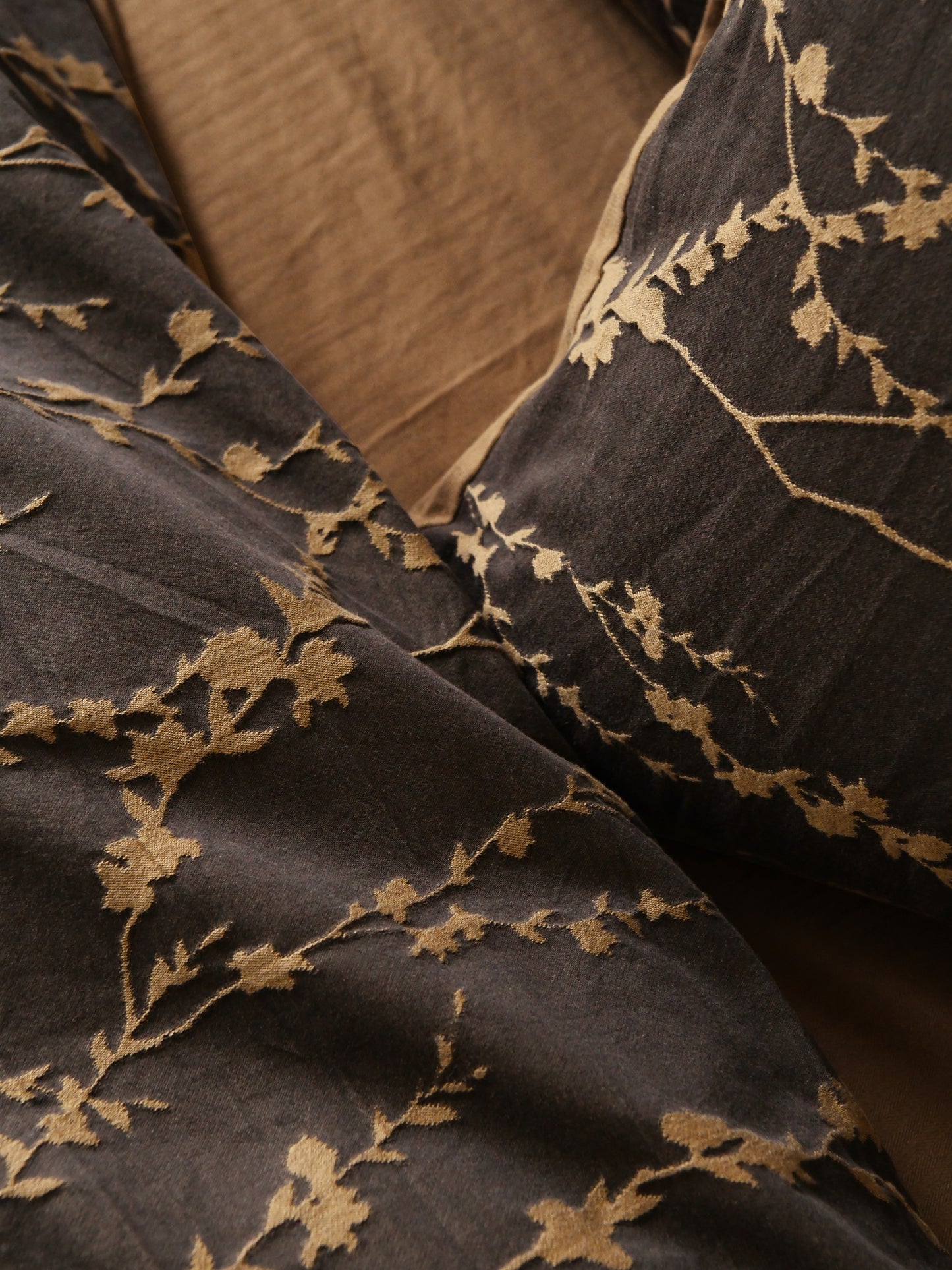 Brown bedding set with intricate vine pattern for a natural, organic look