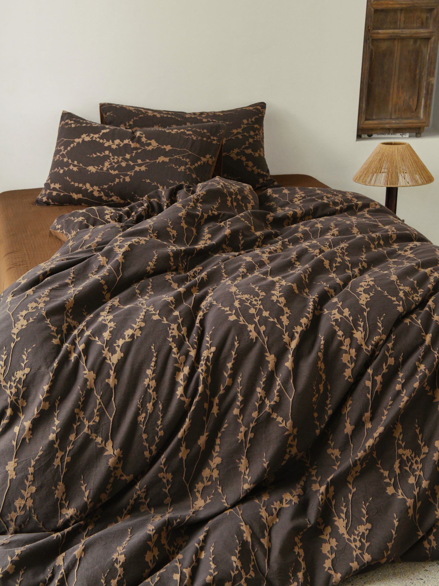 Cocoa Vine Bedding Set featuring brown vine patterns on soft fabric, ideal for earthy modern bedroom decor.