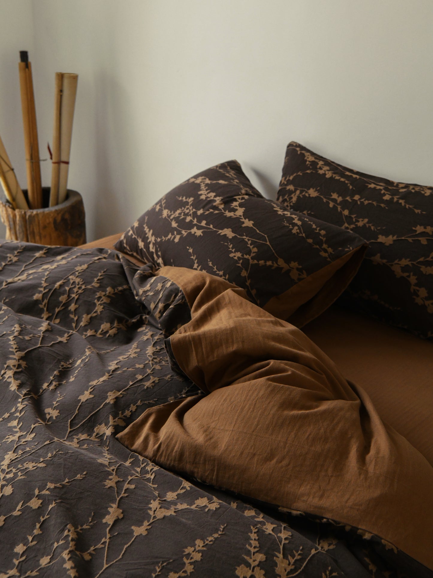 Brown bedding set with intricate vine pattern for a natural, organic look