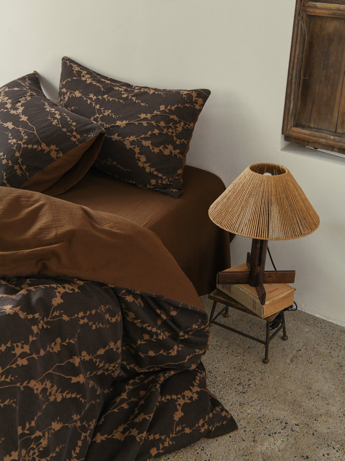 Brown bedding set with intricate vine pattern for a natural, organic look