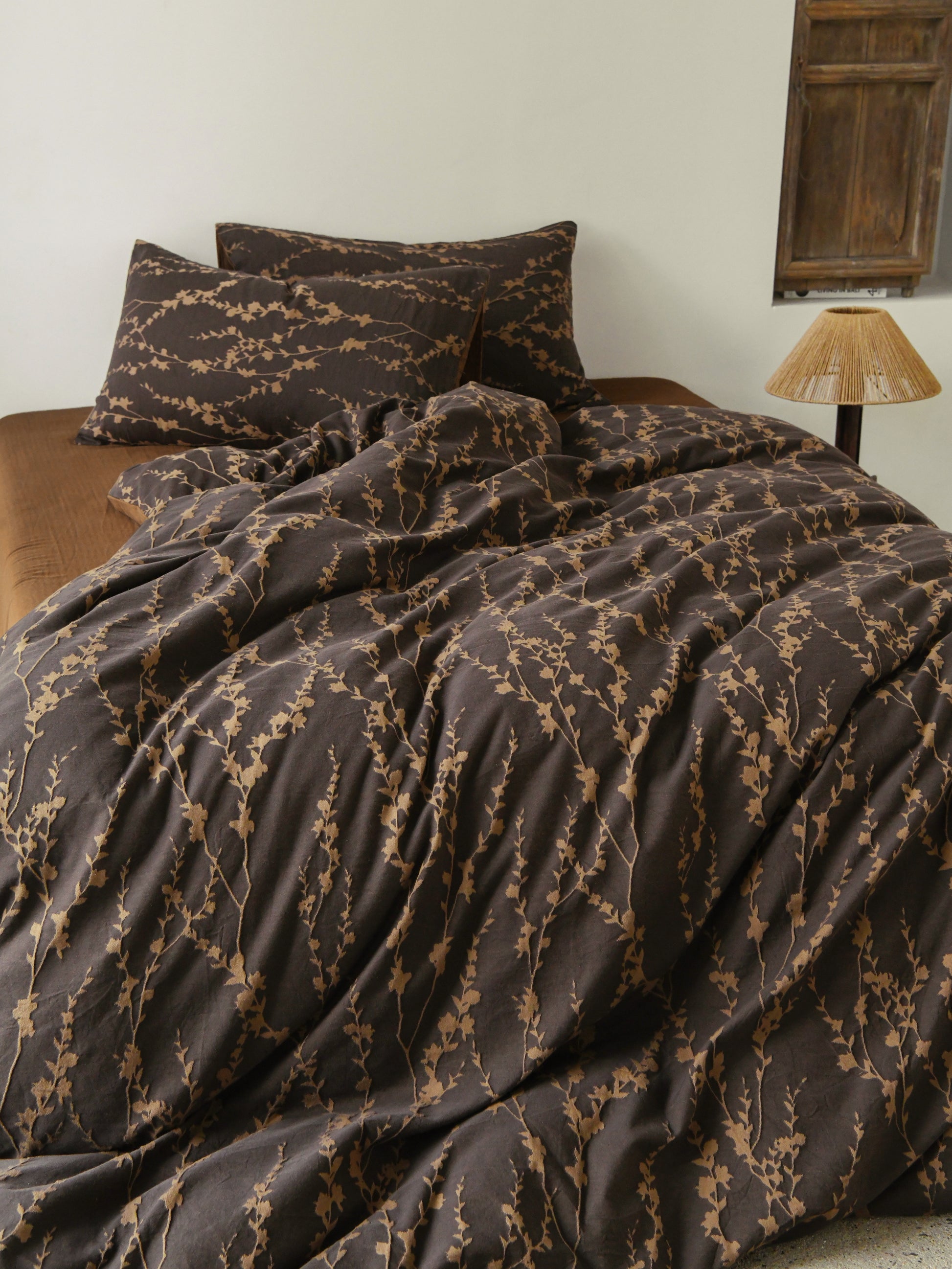 Cocoa Vine Bedding Set featuring brown vine patterns on soft fabric, ideal for earthy modern bedroom decor.