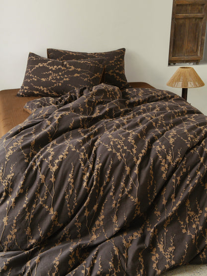 Cocoa Vine Bedding Set featuring brown vine patterns on soft fabric, ideal for earthy modern bedroom decor.