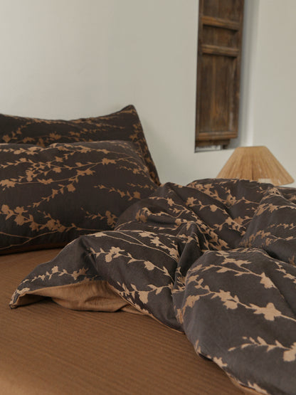 Brown bedding set with intricate vine pattern for a natural, organic look
