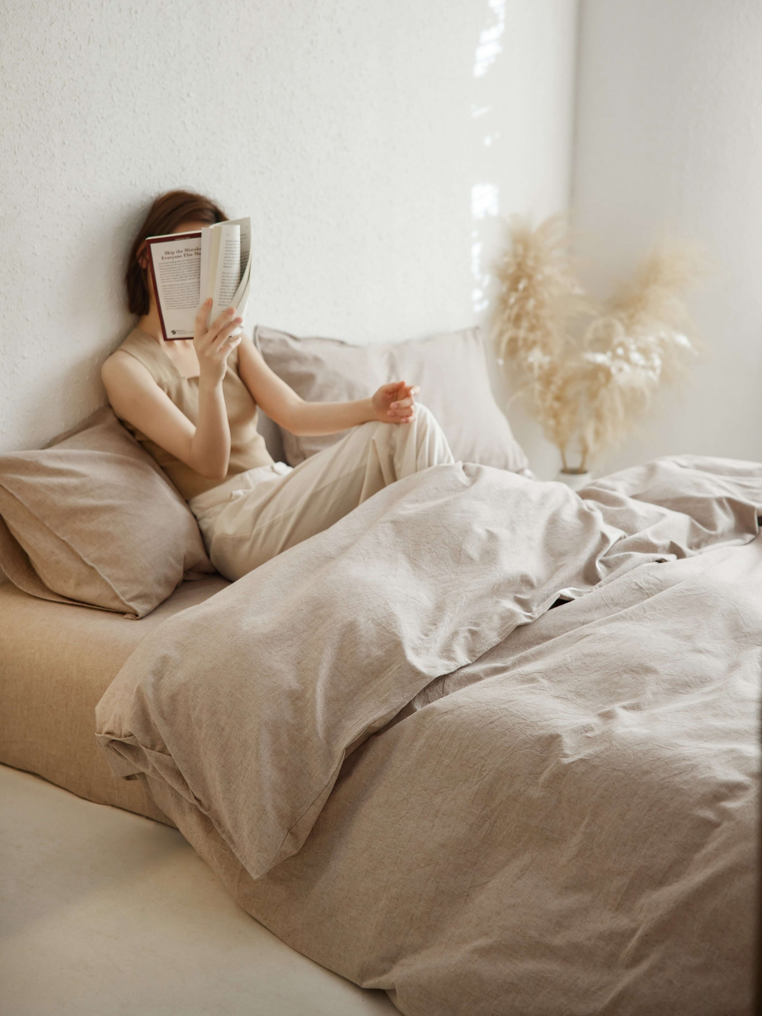 Neutral latte linen bedding with natural textured weave.